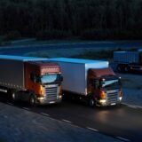Three-orange-Scania-trucks